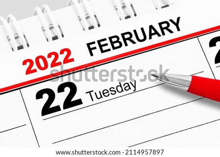 Calendar 2022  February 22 and red pen  Royalty-Free Stock Photo #2114957897