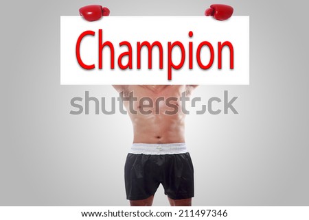 fight and competition sign with an red boxing glove holding a white banner and word champion as a business symbol of competitive sales or boxing day specials