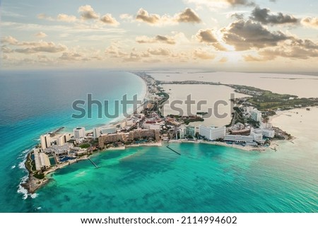 View of beautiful Hotels in the hotel zone of Cancun at sunset. Riviera Maya region in Quintana roo on Yucatan Peninsula Royalty-Free Stock Photo #2114994602