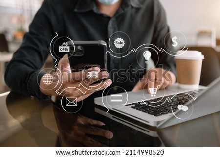 Hand using tablet ,laptop, and holding mobile phone with credit card online banking payment communication network, internet wireless application virtual icon 
 Royalty-Free Stock Photo #2114998520