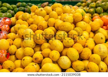 Portrait of oranges being sold in supermarkets.