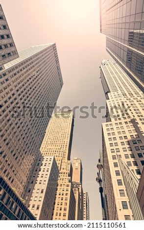 Retro toned picture of Manhattan skyscrapers, New York City, USA.