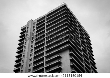black and white photo of a multi-storey building