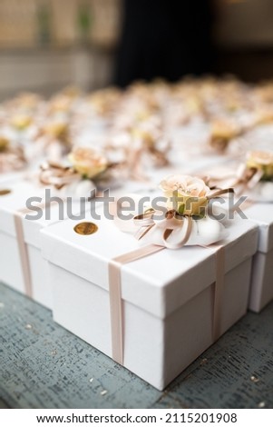 Gift or present box with flower at the wedding Royalty-Free Stock Photo #2115201908