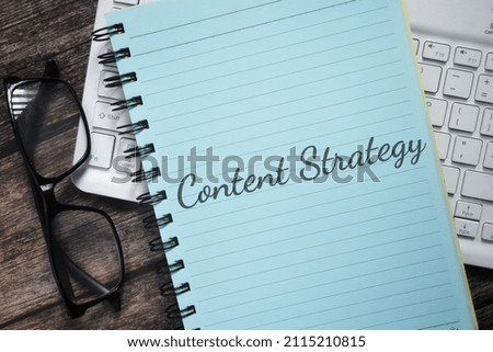 Top view book with Content Strategy wording. Marketing concept
