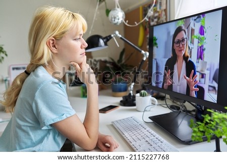 Online session of a teenage girl and a psychologist, social worker Royalty-Free Stock Photo #2115227768