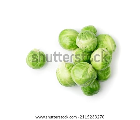 Brussels sprouts pile isolated. Brassica oleracea cabbage top view, edible buds group on white background Royalty-Free Stock Photo #2115233270