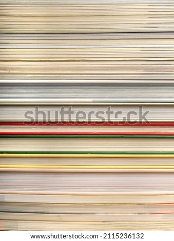 Book stack texture background. Old magazine edges close up, journal pile, detailed book edge, vintage comicbook pack, waste paper side view