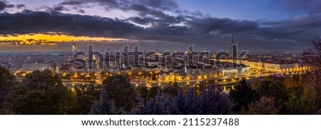 Beautiful breathtaking evening panoramic cityscape of the majestic famous ancient italian city of Turin Royalty-Free Stock Photo #2115237488