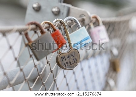 Couples in love: Close-up of padlocks on a fence