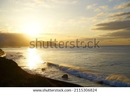 A beautiful coast line at sunset.