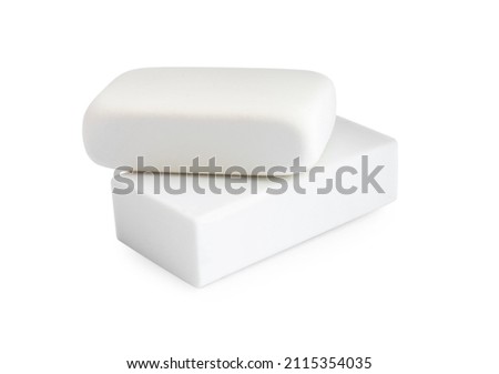 New erasers isolated on white. School stationery