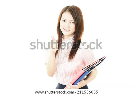 Business woman showing thumbs up sign