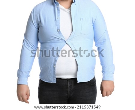 Overweight man in tight clothes on white background, closeup Royalty-Free Stock Photo #2115371549