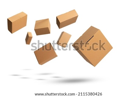 flying cardboard boxes on white background Royalty-Free Stock Photo #2115380426