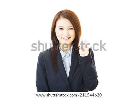 Business woman showing thumbs up sign