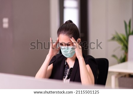 Asian woman have a migraine during working at office,Female suffering from headache