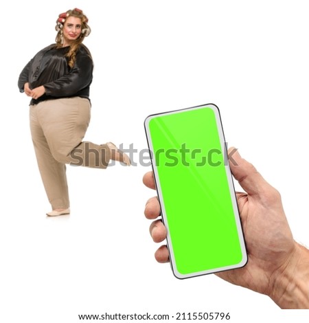 Male hand taking photo of young overweight plus size woman with smartphone, green chromakey display