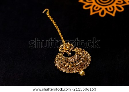 indian jewelry on black background