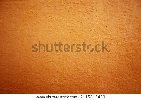 Seamless texture of brown cement old wall a rough surface, with space for text, for a background.	