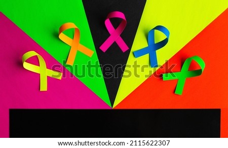 World cancer day background. Colorful ribbons, cancer awareness.