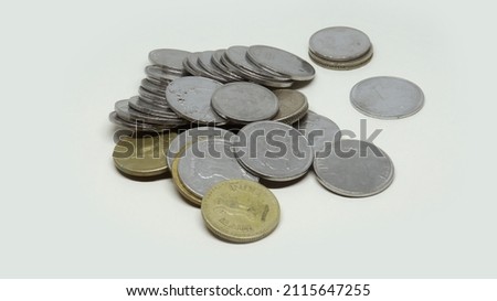 Pile of Indian Rupee Coins. On a white background