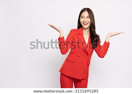 Happy Asian businesswoman presenting or showing open hand palm with copy space for product isolated over white background
