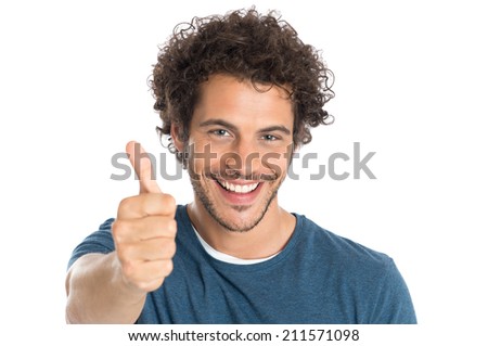 Portrait Of Happy Young Man Showing Thumb Up Isolated On White Background