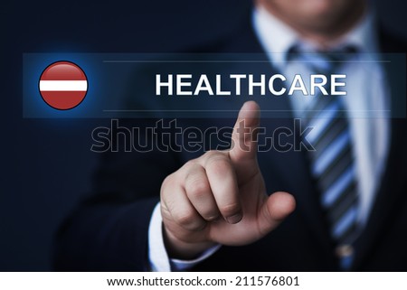 Latvia healthcare concept. Man pressing virtual button with flag icon