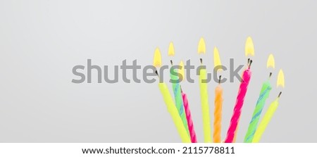 Kwanzaa banner with burn candles on a background