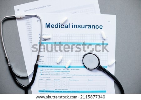 health insurance application. Stethoscope and health medical form. claim form. Male doctor. 