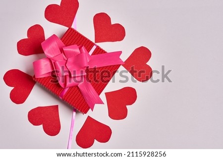 Cute red and colorful gift bags and boxes. Gifts for valentine's day. The day of love and friendship. Hearts, love, affection, friends, celebration, ribbons and bows.