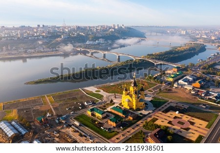 Aerial photo of Alexander Nevsky Cathedral in Nizhny Novgorod and Oka River embankment. Royalty-Free Stock Photo #2115938501