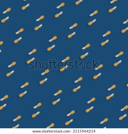 Colorful fruit pattern of pineapples on blue background. Top view. Flat lay. Pop art design