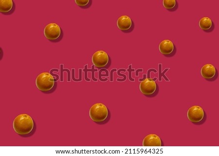 Colorful fruit pattern of fresh grapefruits on pink background with shadows. Top view. Flat lay. Pop art design