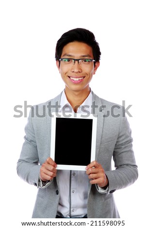Smiling asian man showing tablet computer screen over white background
