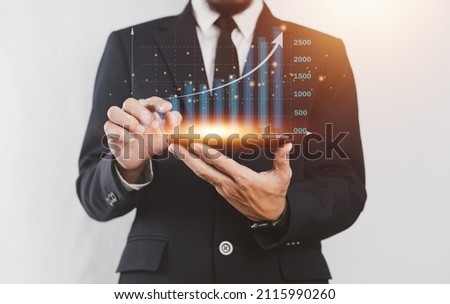 Businessman trading stock market on visual screen digital chart data analysis , Trader  
