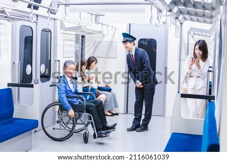 Passengers in wheelchairs on the train