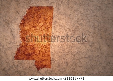 map of mississippi state on a old ancient vintage crack paper background