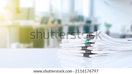 stack of reporting paper documents on a business table in the office, business documents for annual reports. Business analytics. Business office concept, soft focus. High quality photo Royalty-Free Stock Photo #2116176797