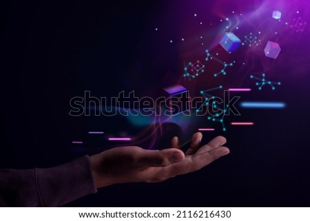 Metaverse, Web3 and Blockchain Technology Concepts. Opened Hand Levitating Virtual Objects. Futuristic Tone Royalty-Free Stock Photo #2116216430