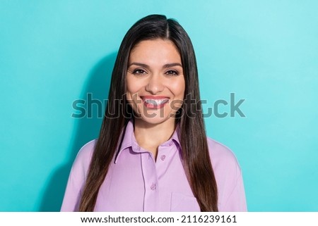 Photo of brunette optimistic mature lady wear purple shirt isolated on teal color background