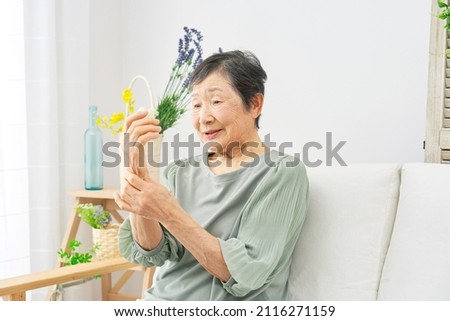 Asian senior woman having the joint pain