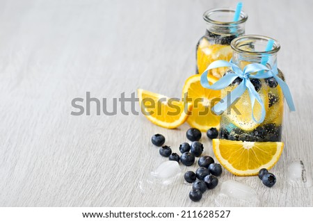 Homemade lemonade in glasses copy space background