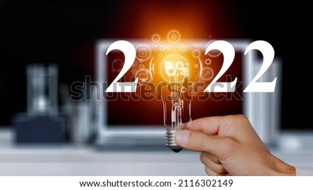 Inspirational pictures of the New Year 2022 with glass bulb