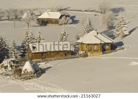 Winter Mountain Landscape on a romanian village