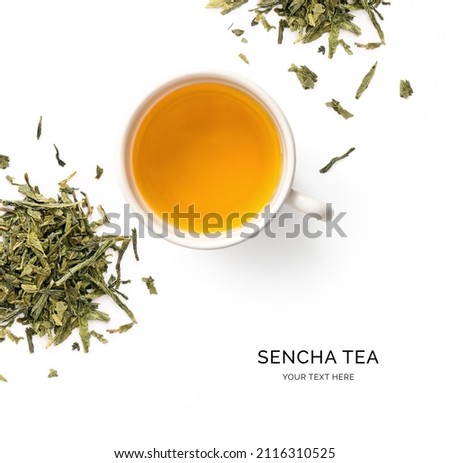 Creative layout made of cup of sencha tea on the white background. Flat lay. Food concept. Royalty-Free Stock Photo #2116310525
