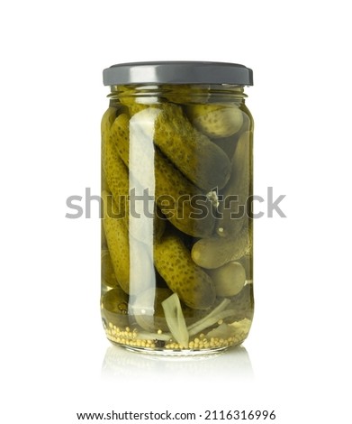 Pickled cucumbers isolated. Pickles in glass jar isolated on white background. Royalty-Free Stock Photo #2116316996
