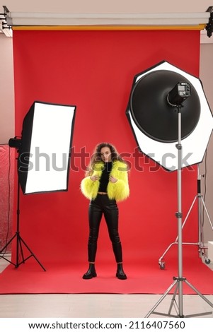 Beautiful African American model posing in studio. Professional photo session