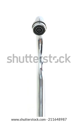 A close up shot of a bathroom faucet